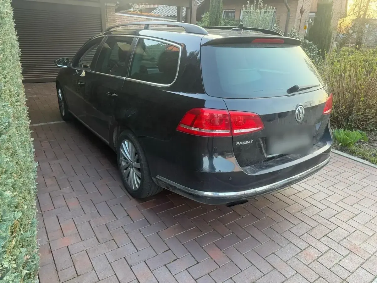 Używany VW Passat 140 KM (102 kW) 2014 Czarny Kombi
