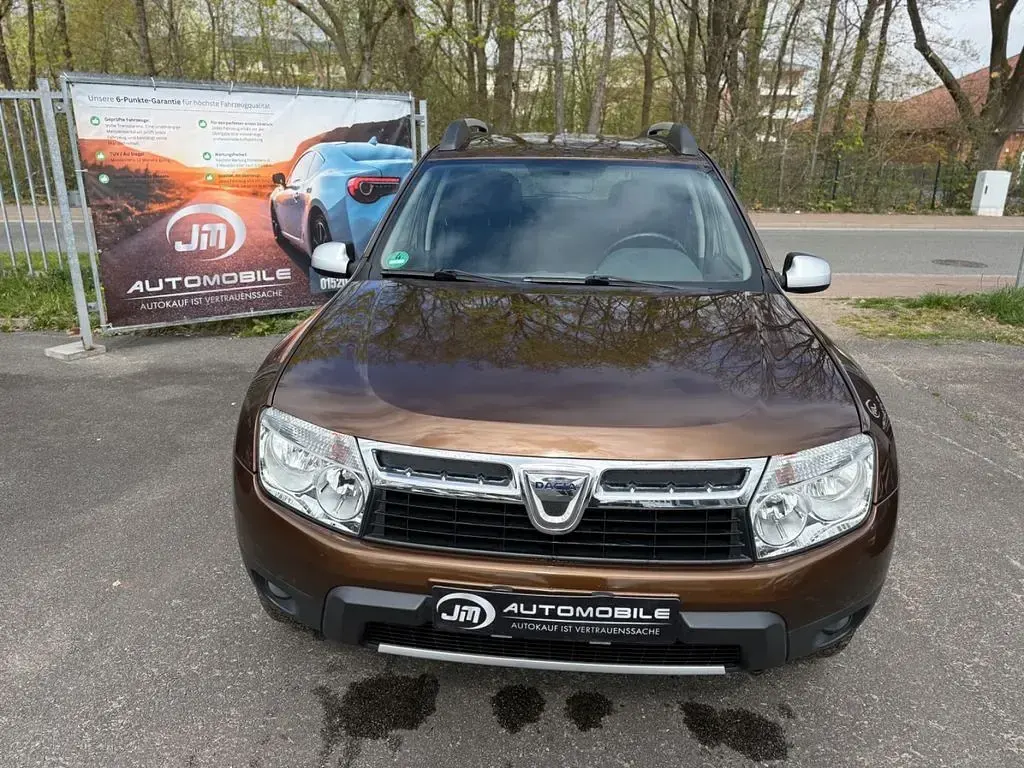 Używany Dacia Duster Lauréate 105 KM (77 kW) 2012 Brązowy SUV