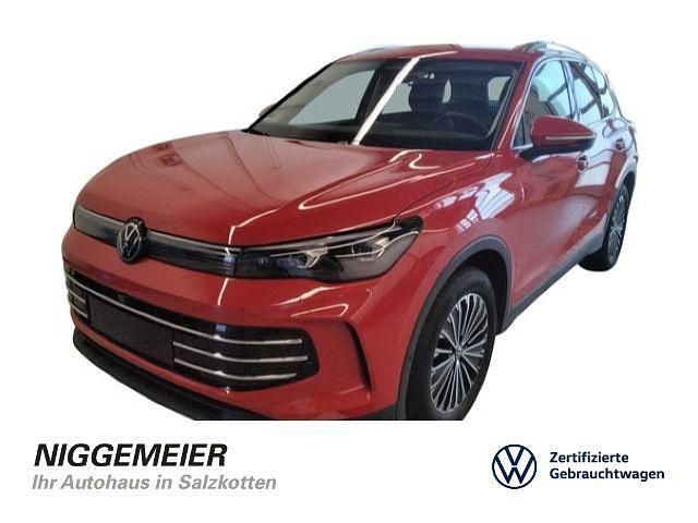 Persimmon red metallic (metallic) Gebraucht 2024 VW Tiguan Elegance SUV | 39.990 € (Fairer Preis) - Bild 1/4