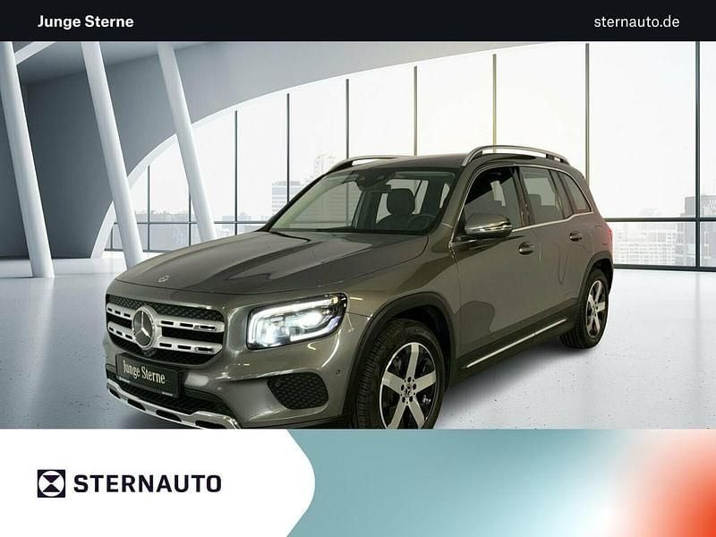Metalliclack mountaingrau Gebraucht 2023 Mercedes GLB220 Progressive SUV | 37.385 € (Fairer Preis) - Bild 1/4