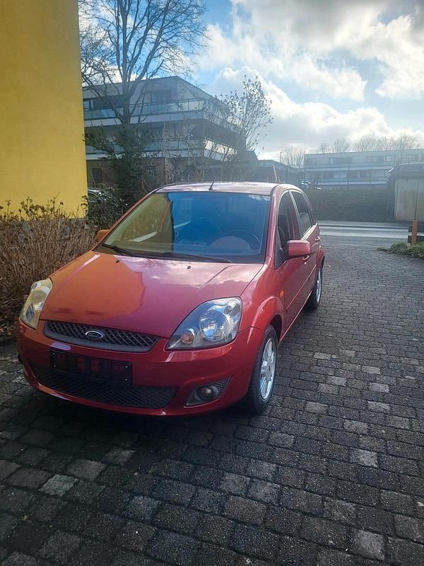 Gebraucht Ford Fiesta Style 101 PS (74 kW) 2007 Orange Kleinwagen