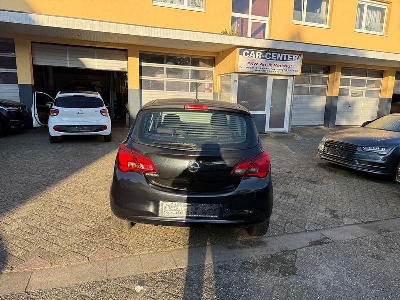 Używany Opel Corsa Edition 90 KM (66 kW) 2016 Czarny Sedan/Limuzyna