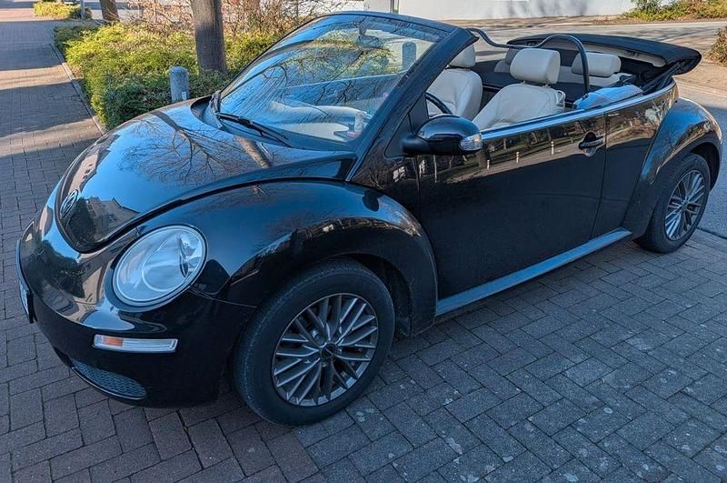 Gebraucht VW New Beetle 102 PS (75 kW) 2010 Schwarz Kleinwagen