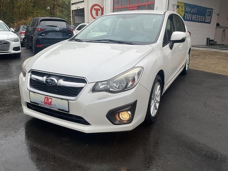 Satin white Gebraucht 2013 Subaru Impreza Comfort Limousine | 8.990 € - Bild 1/4