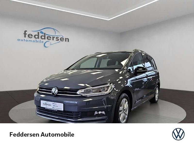 Grau Gebraucht 2024 VW Touran Highline Van / Kleinbus | 39.879 € (Teuer) - Bild 1/4