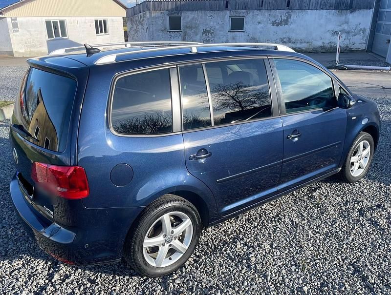Second-hand VW Touran 140 CP (102 kW) 2013 Albastru Monovolum