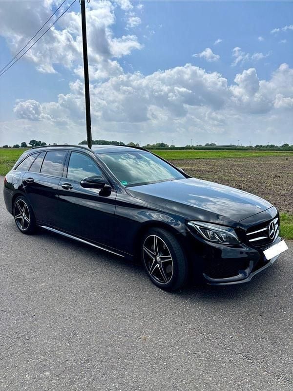 Schwarz Gebraucht 2016 Mercedes C220 AMG line Kombi | 17.300 € (Fairer Preis) - Bild 1/4