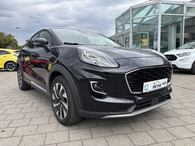 Agate black metallic Gebraucht 2022 Ford Puma Titanium SUV | 16.900 € (Guter Preis) - Bild 1/4