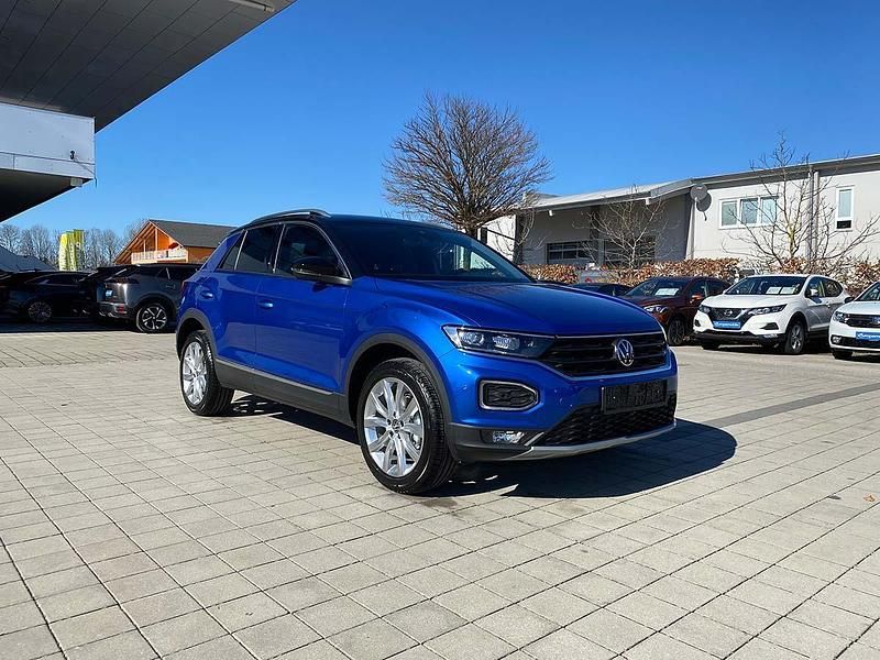 Ravennablau metallic schwarz Gebraucht 2021 VW T-Roc Sport SUV | 20.760 € (Superpreis) - Bild 1/4