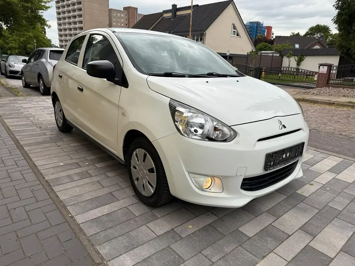 Gebraucht Mitsubishi Space Star 71 PS (52 kW) 2015 Weiß Kleinwagen