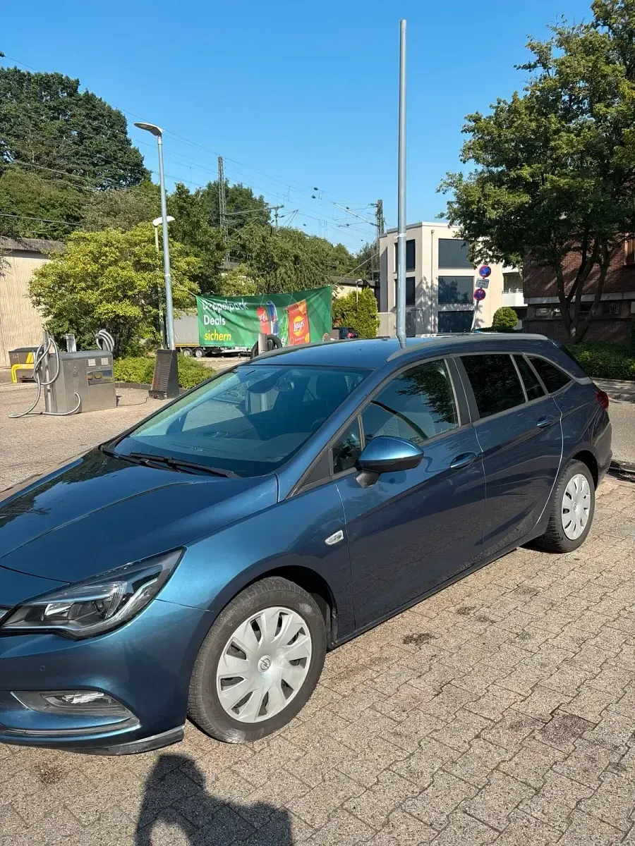 Gebraucht Opel Astra Business 135 PS (99 kW) 2017 Blau Kombi