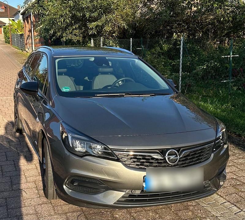 Grau Gebraucht 2021 Opel Astra Design Edition Kombi | 10.400 € (Superpreis) - Bild 1/4