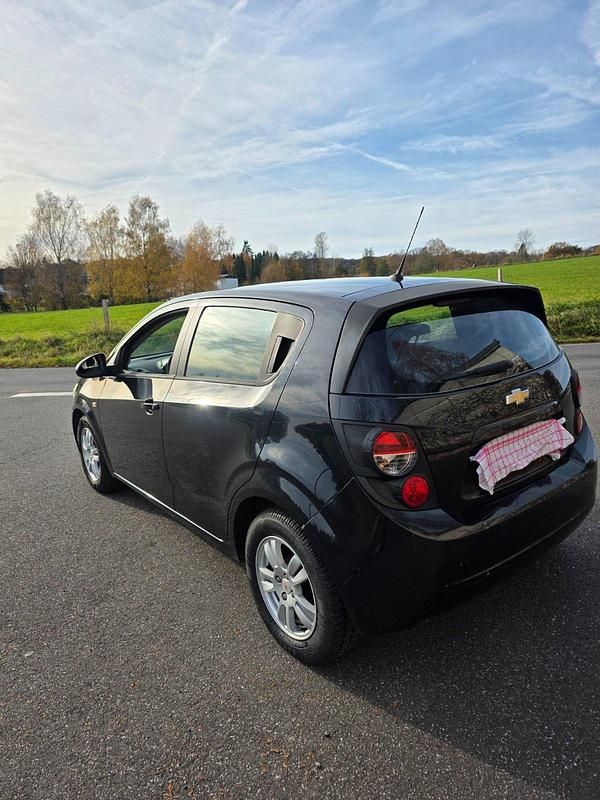Gebraucht Chevrolet Aveo 101 PS (74 kW) 2011 Schwarz Kleinwagen