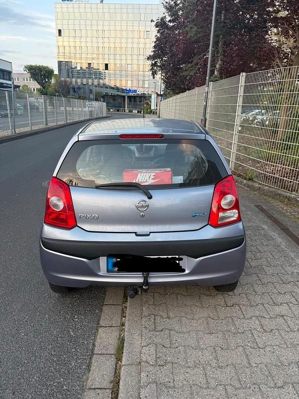 Gebraucht Nissan Pixo 80 PS (58 kW) 2008 Blau Kleinwagen