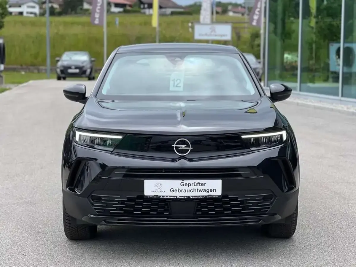 Gebraucht Opel Mokka-e Elegance 100 kW (136 PS) 2024 Karbon schwarz metallic SUV