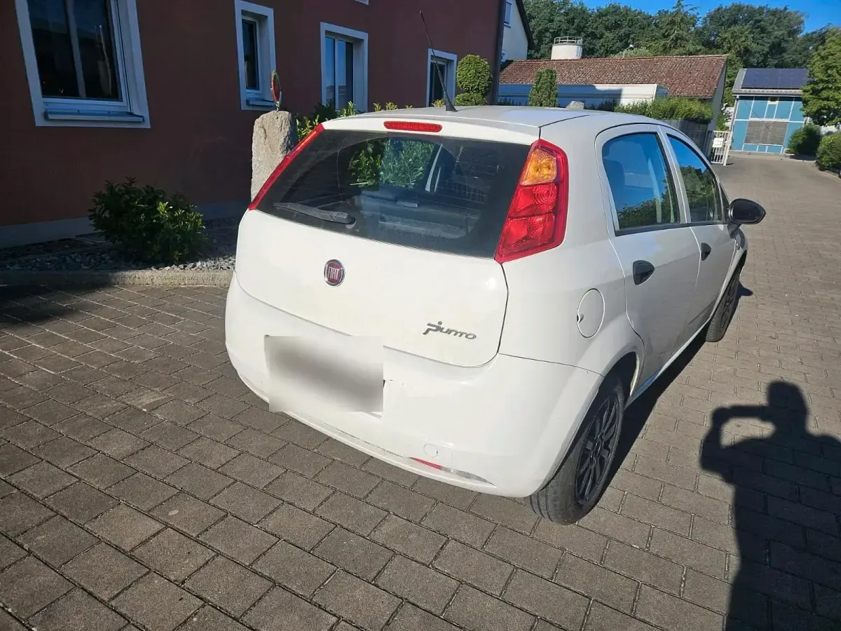 Gebraucht Fiat Grande Punto 70 PS (51 kW) 2013 Weiß Kleinwagen