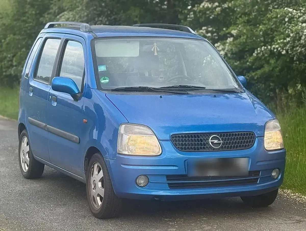 Używany Opel Agila 75 KM (55 kW) 2003 Niebieski Minivan