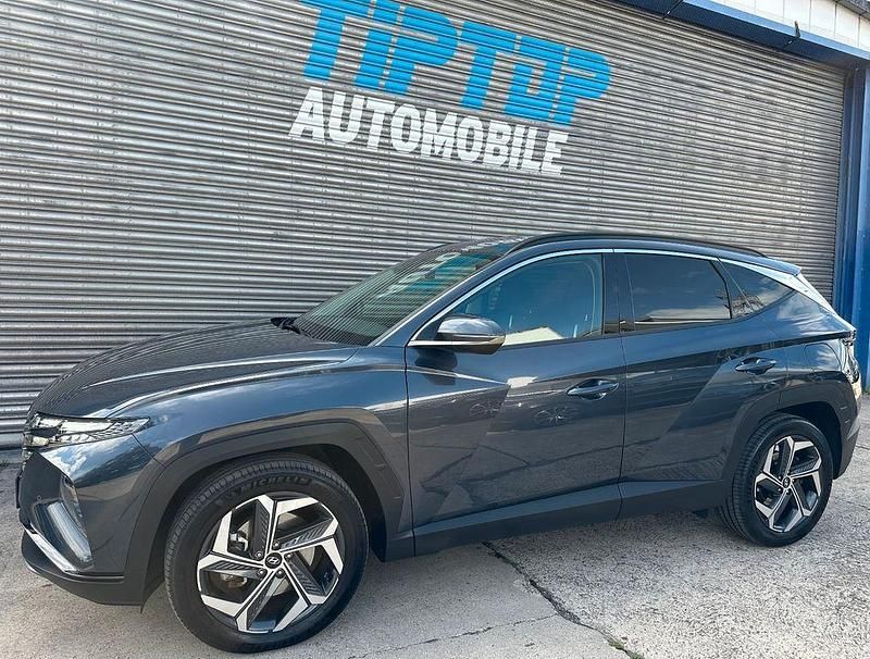 Grau Gebraucht 2022 Hyundai Tucson Prime SUV | 28.990 € (Guter Preis) - Bild 1/4