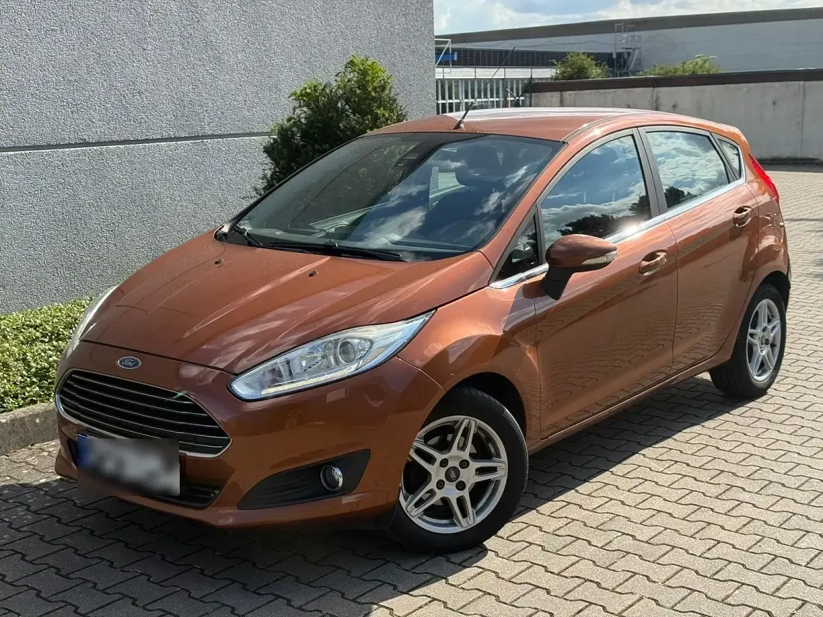 Gebraucht Ford Fiesta 95 PS (69 kW) 2014 Orange Kleinwagen