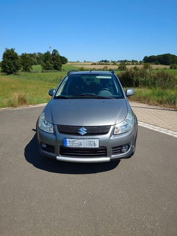 Silber Gebraucht 2007 Suzuki SX4 Comfort Limousine | 3.999 € (Fairer Preis) - Bild 1/4