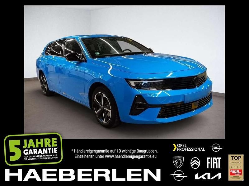 Gebraucht Opel Astra 131 PS (96 kW) 2025 Lackierung watteau grn/typ aus Kombi