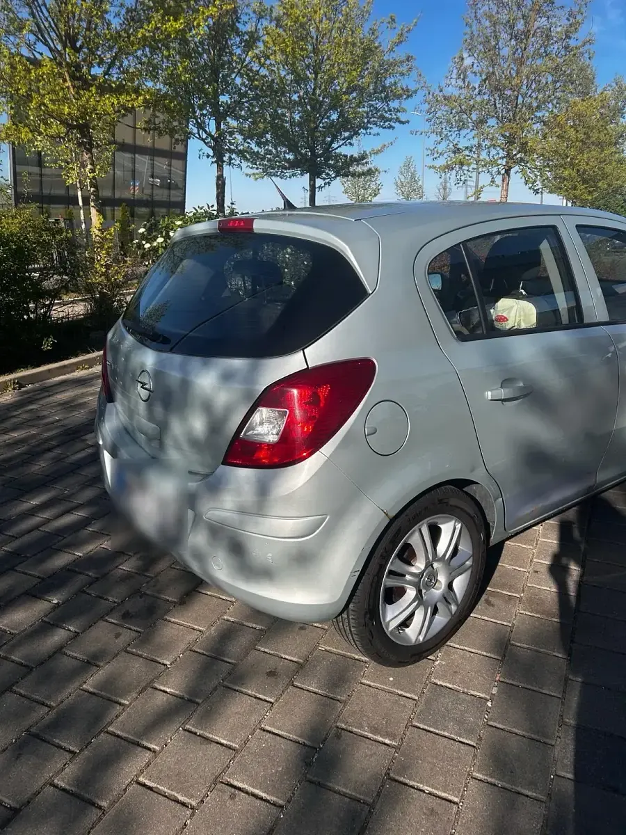 Second-hand Opel Corsa 90 CP (66 kW) 2009 Argintiu Hatchback
