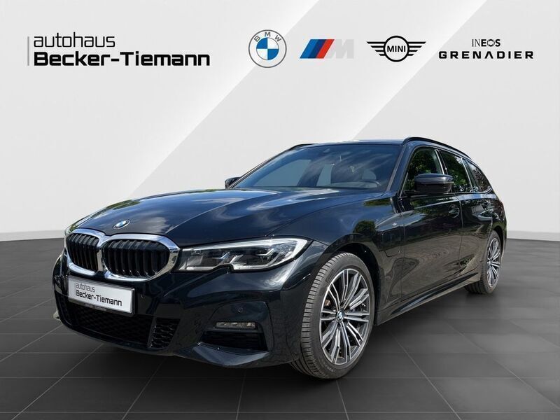 Saphirschwarz Gebraucht 2021 BMW 330e M Sport Kombi | 28.910 € (Guter Preis) - Bild 1/4