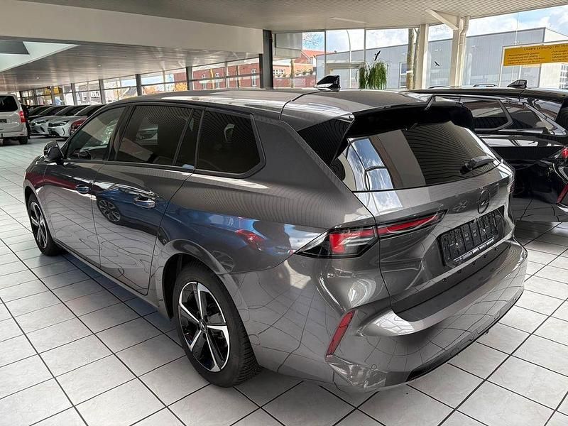 Gebraucht Opel Astra 131 PS (96 kW) 2024 Mondsteingrau metallic (metallic) Kombi