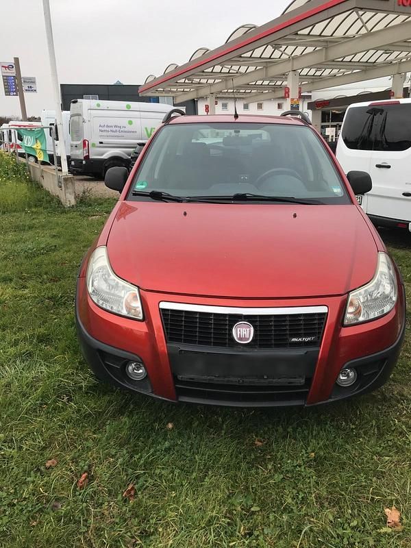 Orange Gebraucht 2008 Fiat Sedici SUV | 2.750 € - Bild 1/4