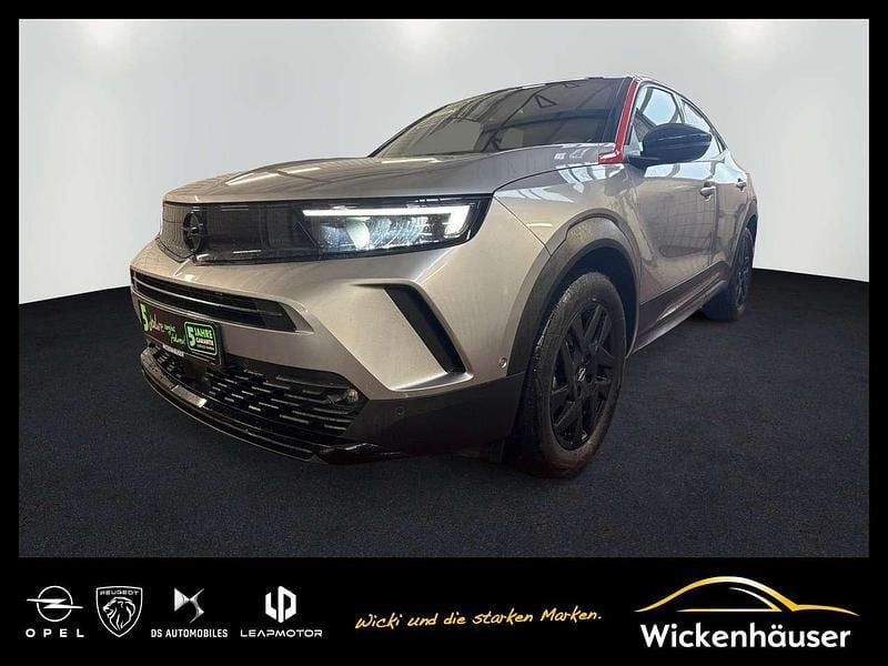 Gebraucht Opel Mokka-e GS Line 100 kW (136 PS) 2022 Kontrast grau/quarz silber SUV