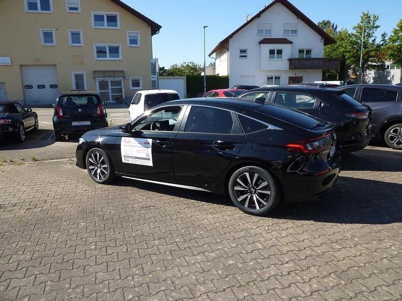 Gebraucht Honda Civic Elegance 143 PS (105 kW) 2025 Schwarz Limousine
