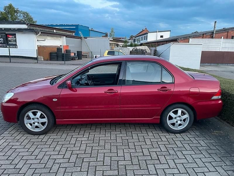 Gebraucht Mitsubishi Lancer 98 PS (72 kW) 2003 Rot Limousine