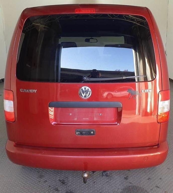 Gebraucht VW Caddy Team 105 PS (77 kW) 2010 Rot Van / Kleinbus