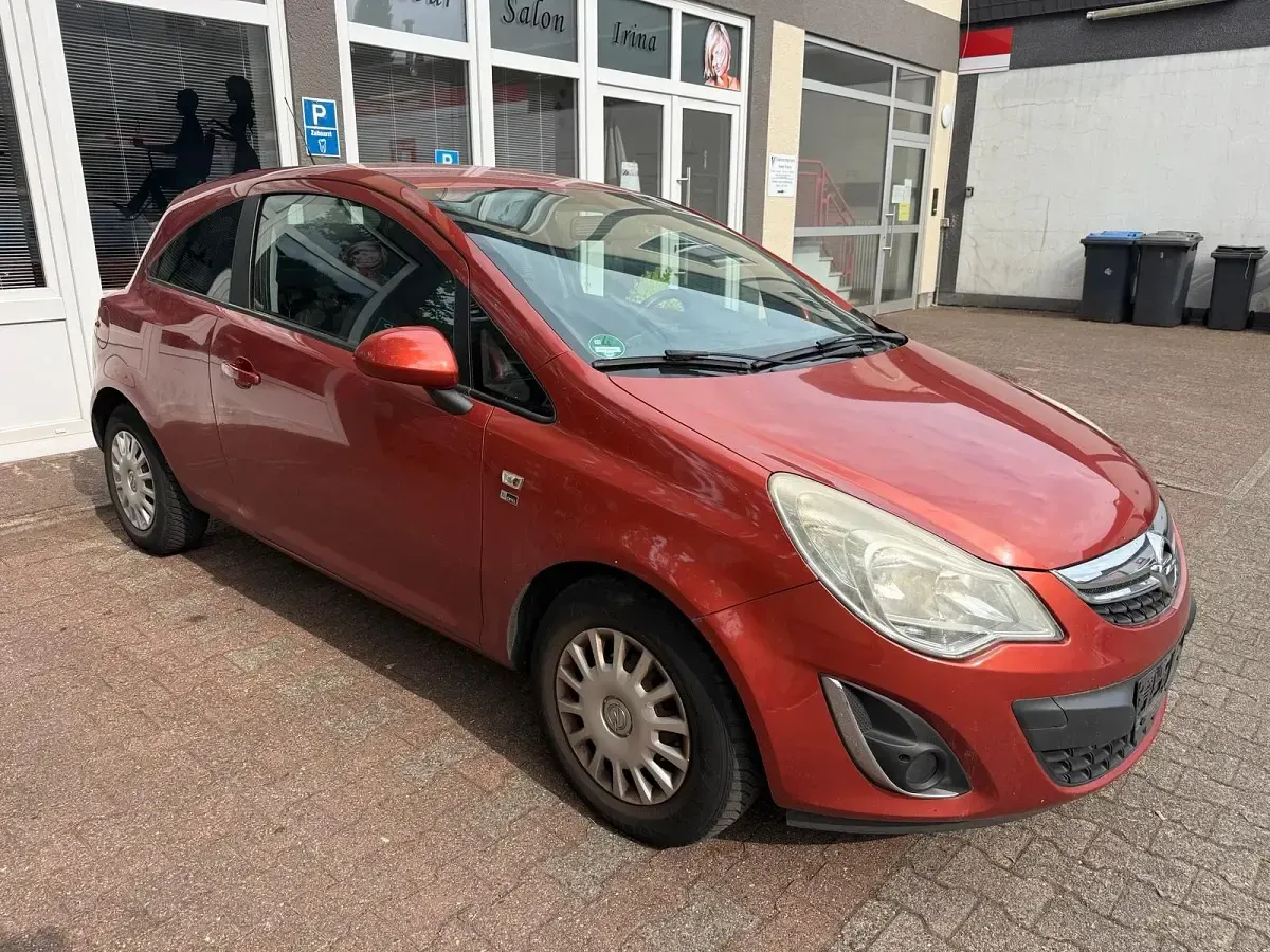 Gebraucht Opel Corsa 101 PS (74 kW) 2012 Orange Kleinwagen