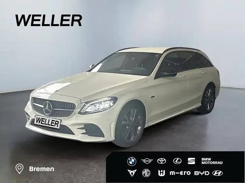 Weiss Gebraucht 2021 Mercedes C300e AMG line Kombi | 29.980 € (Fairer Preis) - Bild 1/3