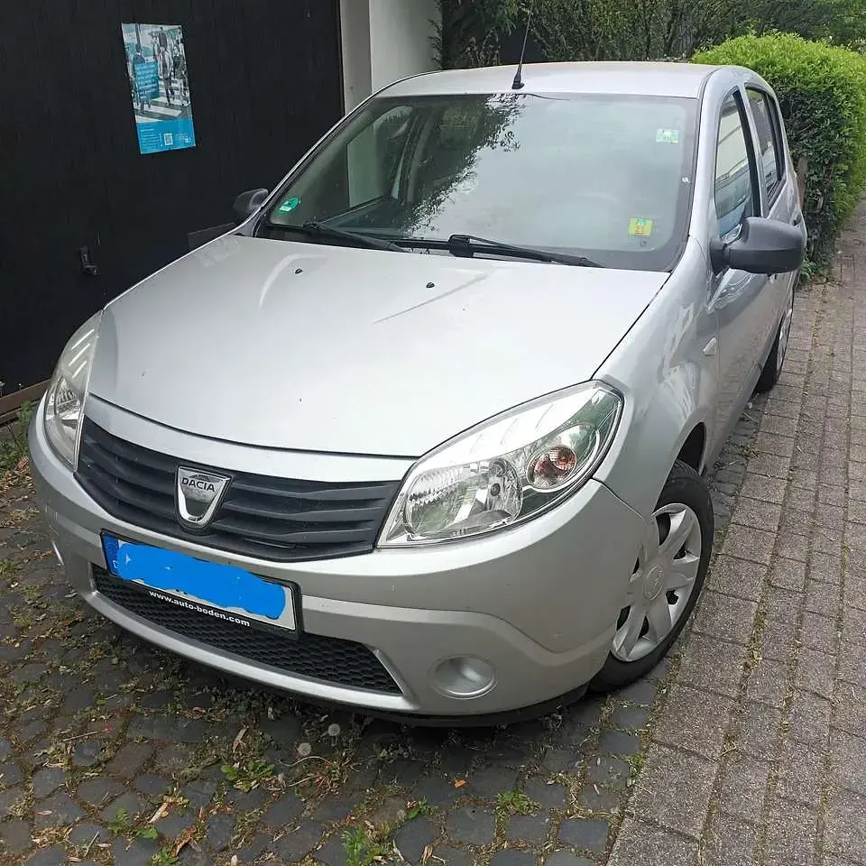 Second-hand Dacia Sandero 75 CP (55 kW) 2012 Argintiu Berlinǎ