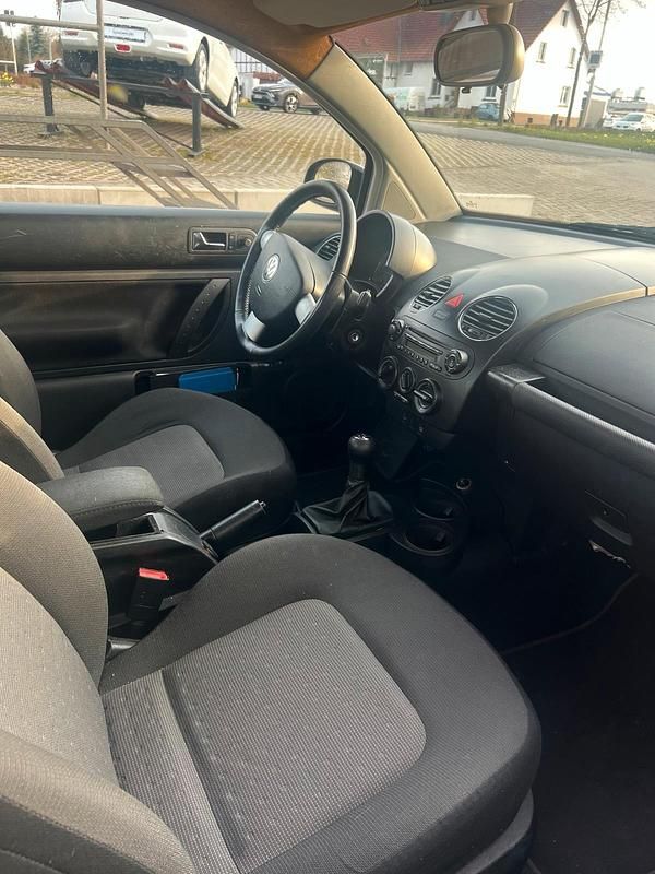 Gebraucht VW New Beetle 75 PS (55 kW) 2006 Schwarz Kleinwagen