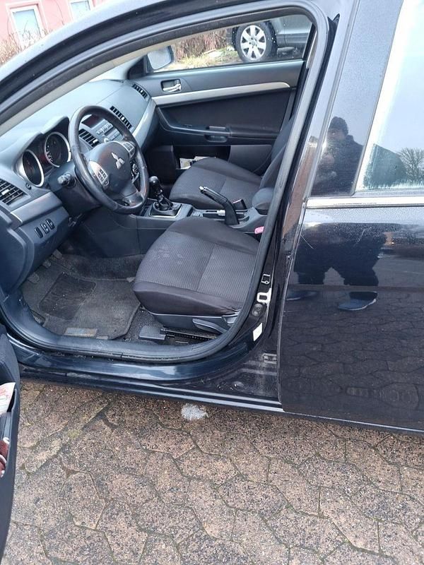 Gebraucht Mitsubishi Lancer Invite 150 PS (110 kW) 2011 Schwarz Limousine