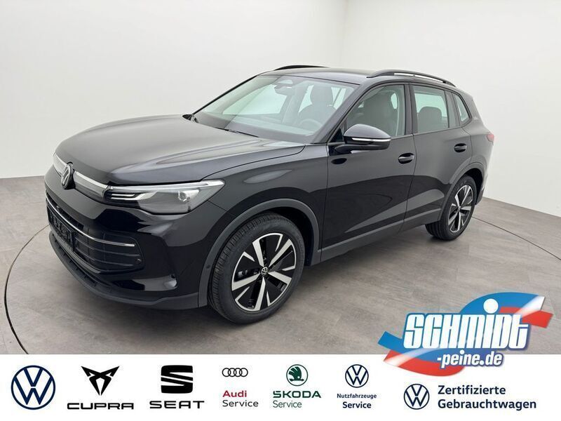 Black metallic Gebraucht 2024 VW Tiguan Goal SUV | 36.700 € - Bild 1/4