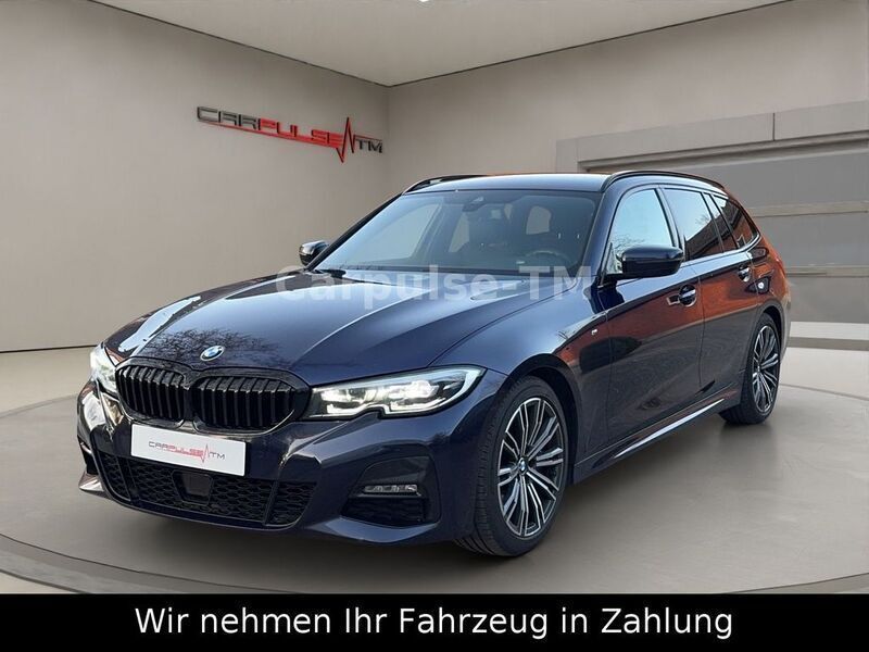 Tansanitblau ii metallic Gebraucht 2021 BMW 330 M Sport Kombi | 27.900 € (Fairer Preis) - Bild 1/4