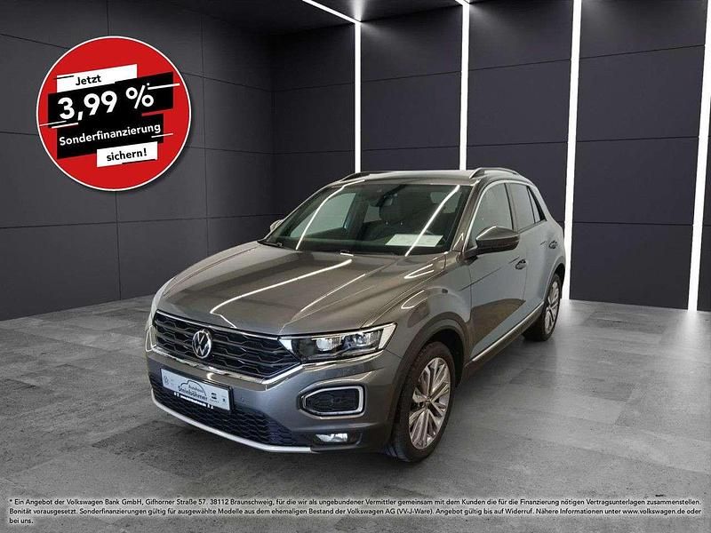 Indiumgrau (grau) Gebraucht 2021 VW T-Roc Sportline SUV | 23.840 € (Fairer Preis) - Bild 1/4