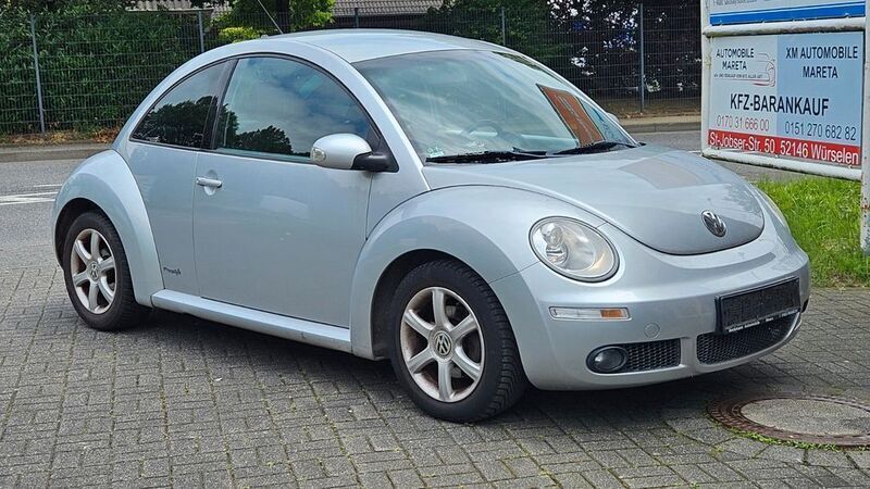 Gebraucht VW New Beetle 102 PS (75 kW) 2010 Reflexsilber metallic Kleinwagen