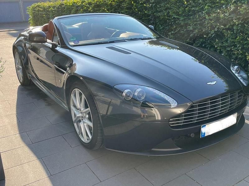 Grau Gebraucht 2013 Aston Martin V8 Vantage Cabrio | 70.900 € (Superpreis) - Bild 1/4