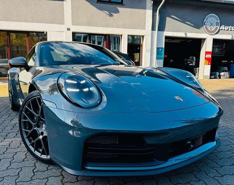 Schiefergrau neo Neu 2024 Porsche 911 Carrera Coupé | 165.410 € (Teuer) - Bild 1/4