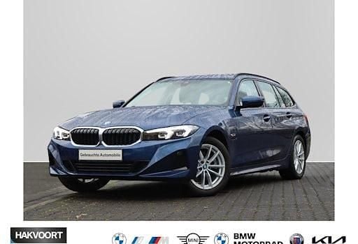 Phytonicblau Gebraucht 2022 BMW 320e Shadowline Kombi | 30.460 € (Guter Preis) - Bild 1/4