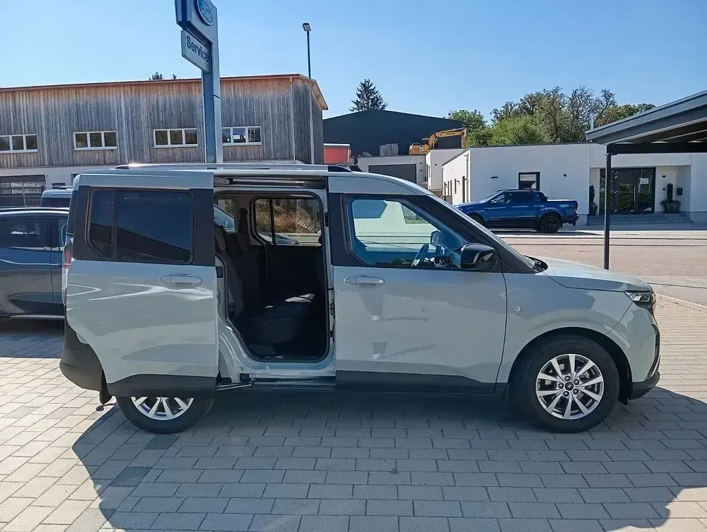 Gebraucht Ford Tourneo Courier Titanium 125 PS (91 kW) 2024 Grau Van / Kleinbus