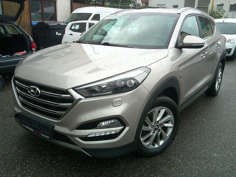 Grau Gebraucht 2015 Hyundai Tucson Style SUV | 10.990 € (Fairer Preis) - Bild 1/4