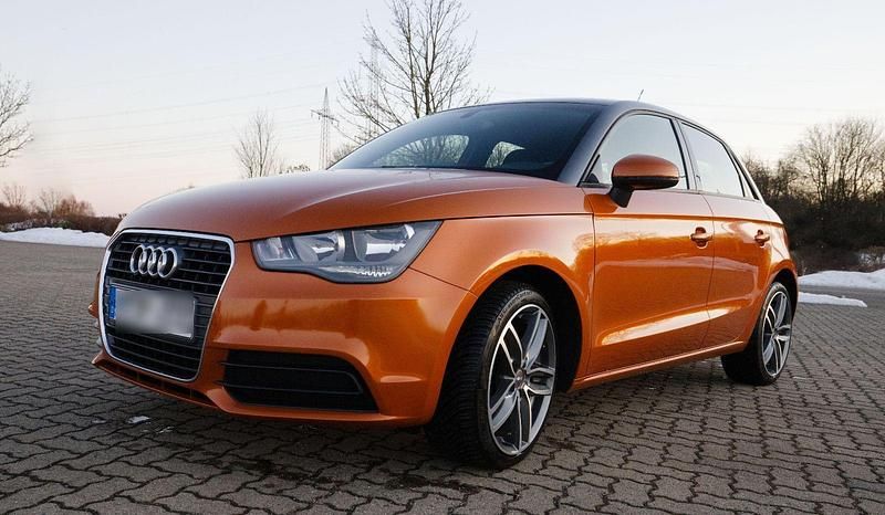Orange Gebraucht 2012 Audi A1 Sportback Attraction Kleinwagen | 8.200 € (Guter Preis) - Bild 1/4