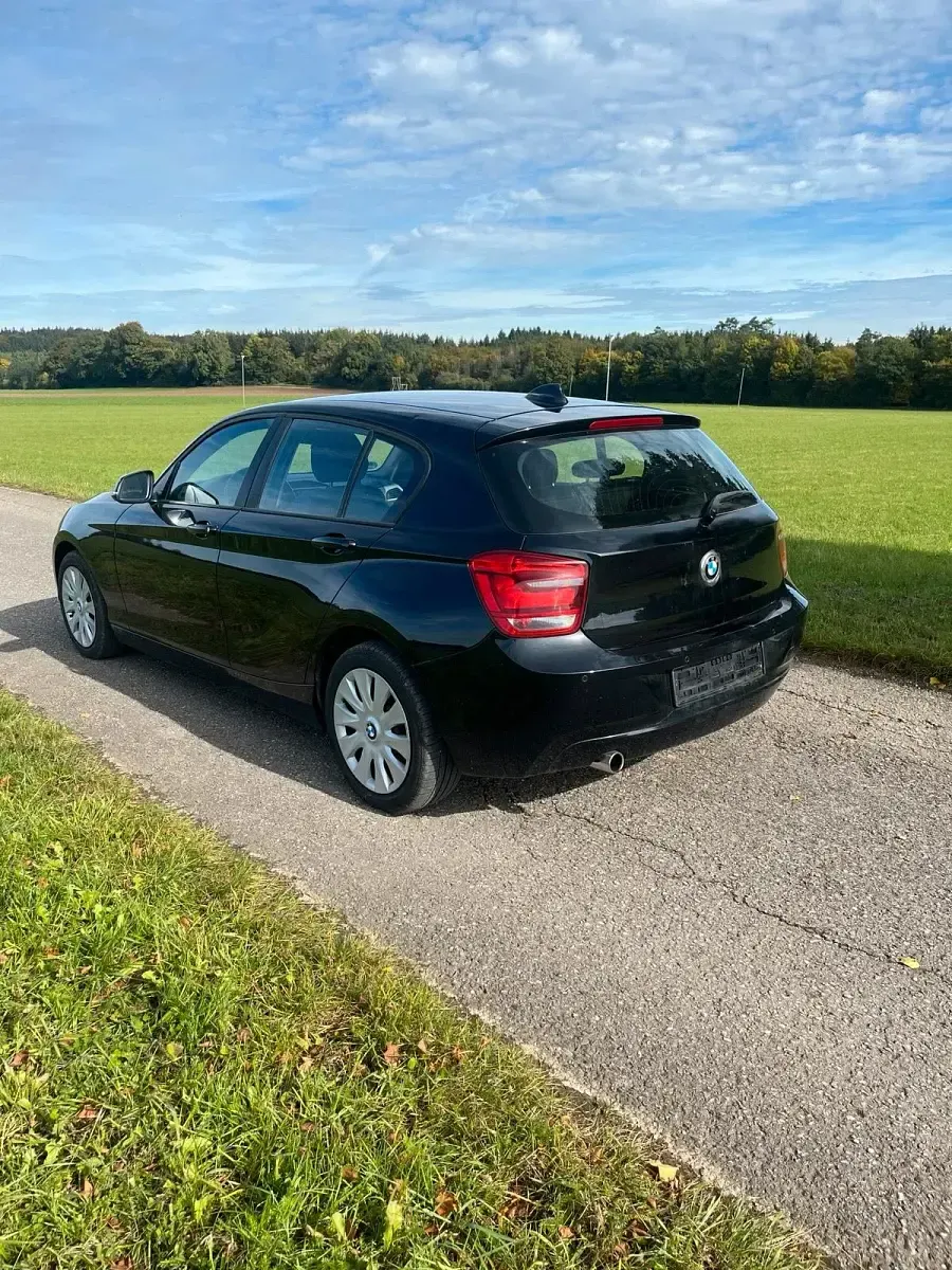 Second-hand BMW 116 136 CP (100 kW) 2011 Negru Hatchback