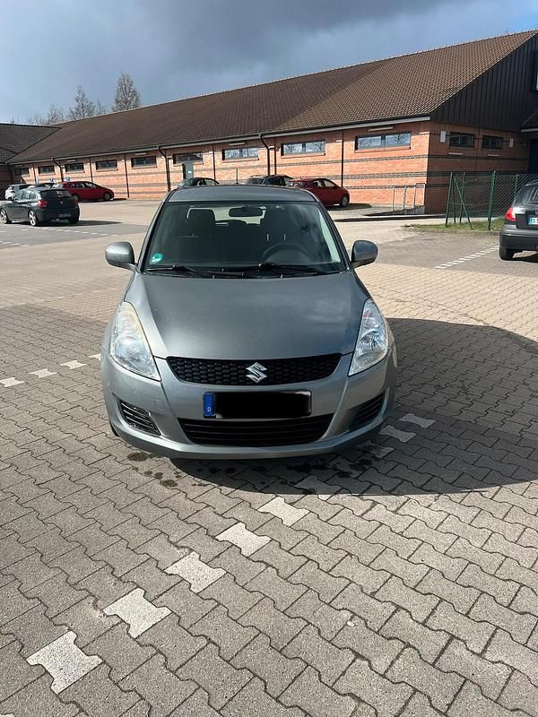 Second-hand Suzuki Swift 94 CP (69 kW) 2011 Argintiu Hatchback